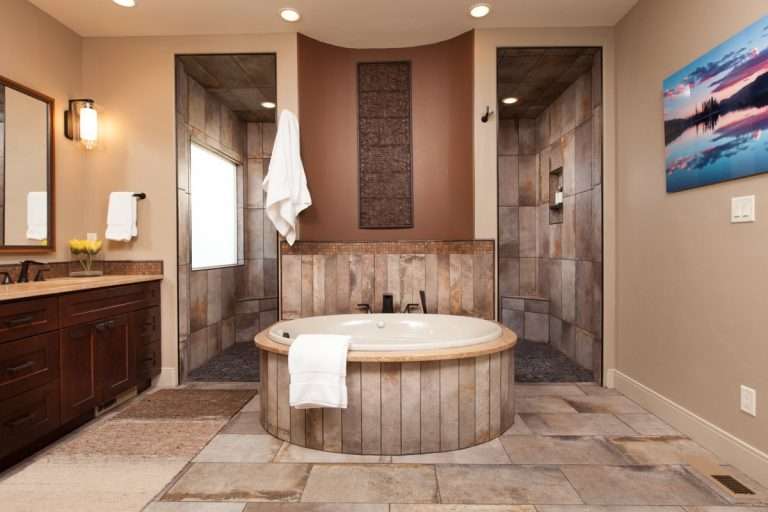 The Prestige primary bathroom with soaking tub, new home by Integrity Homes in Western Colorado