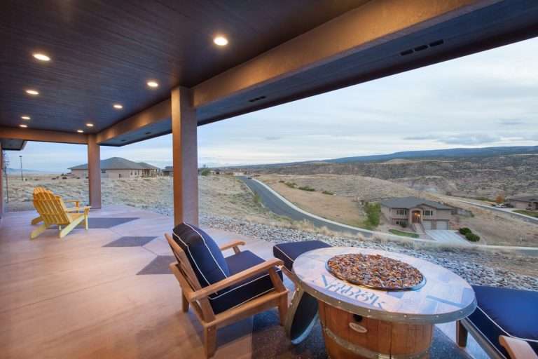 The Prestige covered patio with fire pit, new home by Integrity Homes in Western Colorado