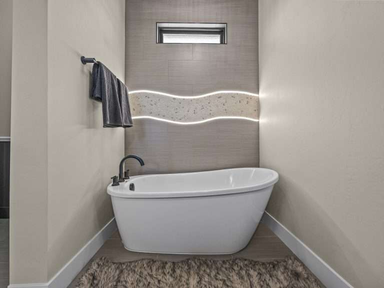 602 Manzanita Drive primary bathroom with freestanding tub, Grand Junction, CO new home by Integrity Homes