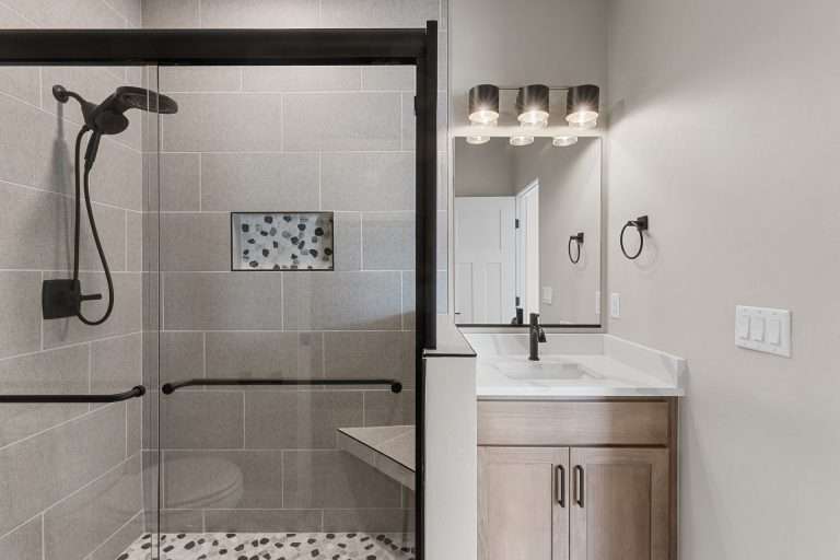 618 Manzanita Drive primary bathroom with walk-in shower, Grand Junction, CO new home by Integrity Homes