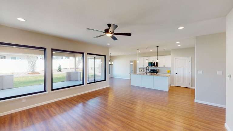 Casa De Pueblo living room and kitchen, new home by Integrity Homes in Western Colorado