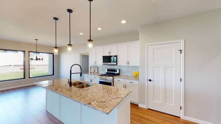 Casa De Pueblo kitchen island, new home by Integrity Homes in Western Colorado