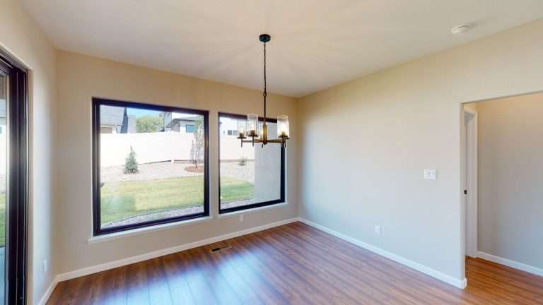 Casa De Pueblo dining area, new home by Integrity Homes in Western Colorado