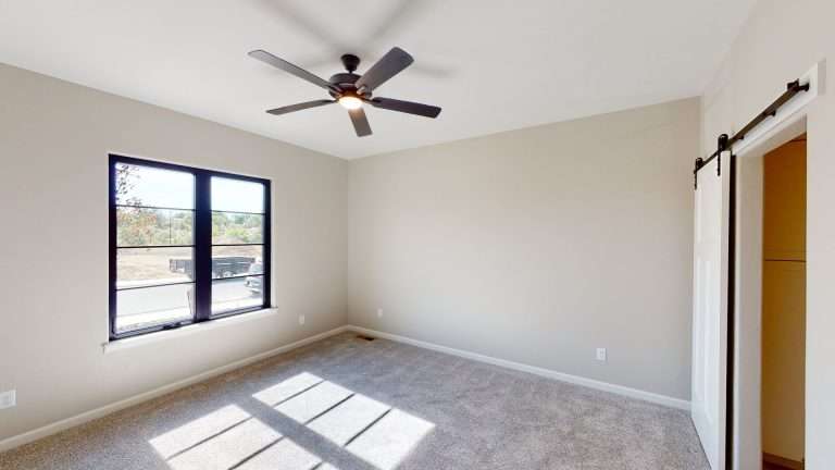 Casa De Pueblo primary bedroom, new home by Integrity Homes in Western Colorado