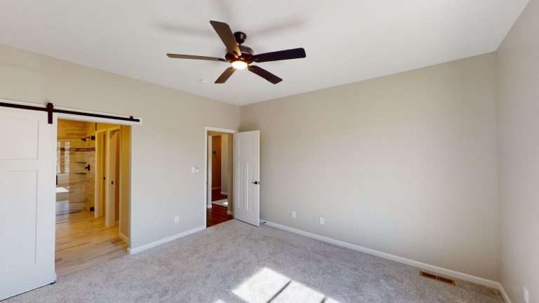 Casa De Pueblo primary bedroom, new home by Integrity Homes in Western Colorado