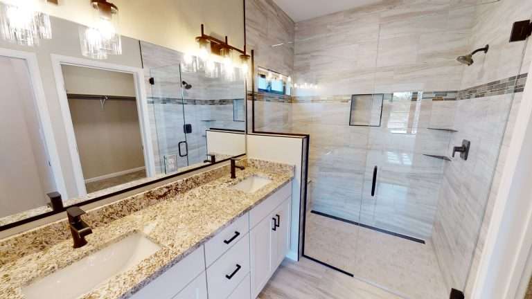 Casa De Pueblo primary bathroom with walk-in shower, new home by Integrity Homes in Western Colorado