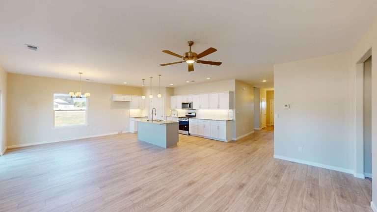 The Merlot great room and kitchen, new home by Integrity Homes in Western Colorado