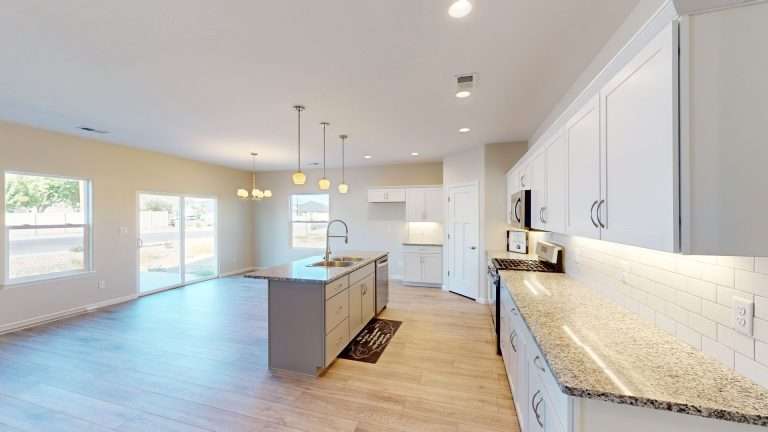 The Merlot kitchen and great room, new home by Integrity Homes in Western Colorado