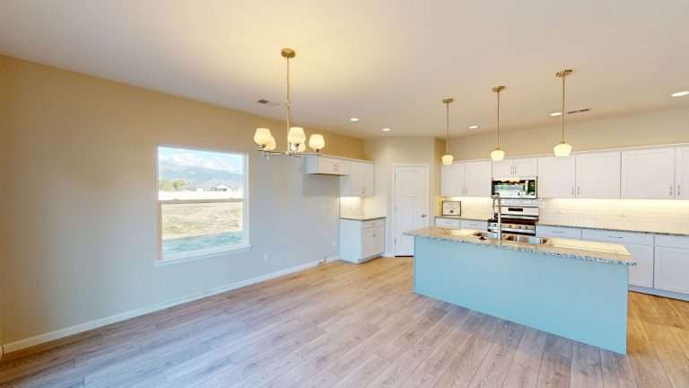 The Merlot kitchen and dining area, new home by Integrity Homes in Western Colorado