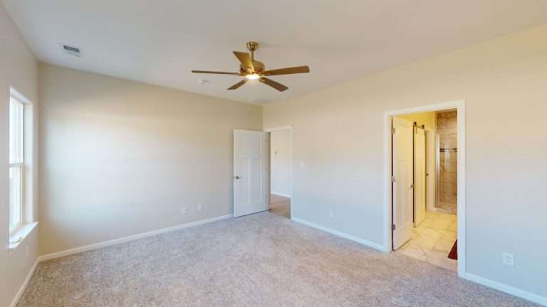 The Merlot primary bedroom, new home by Integrity Homes in Western Colorado