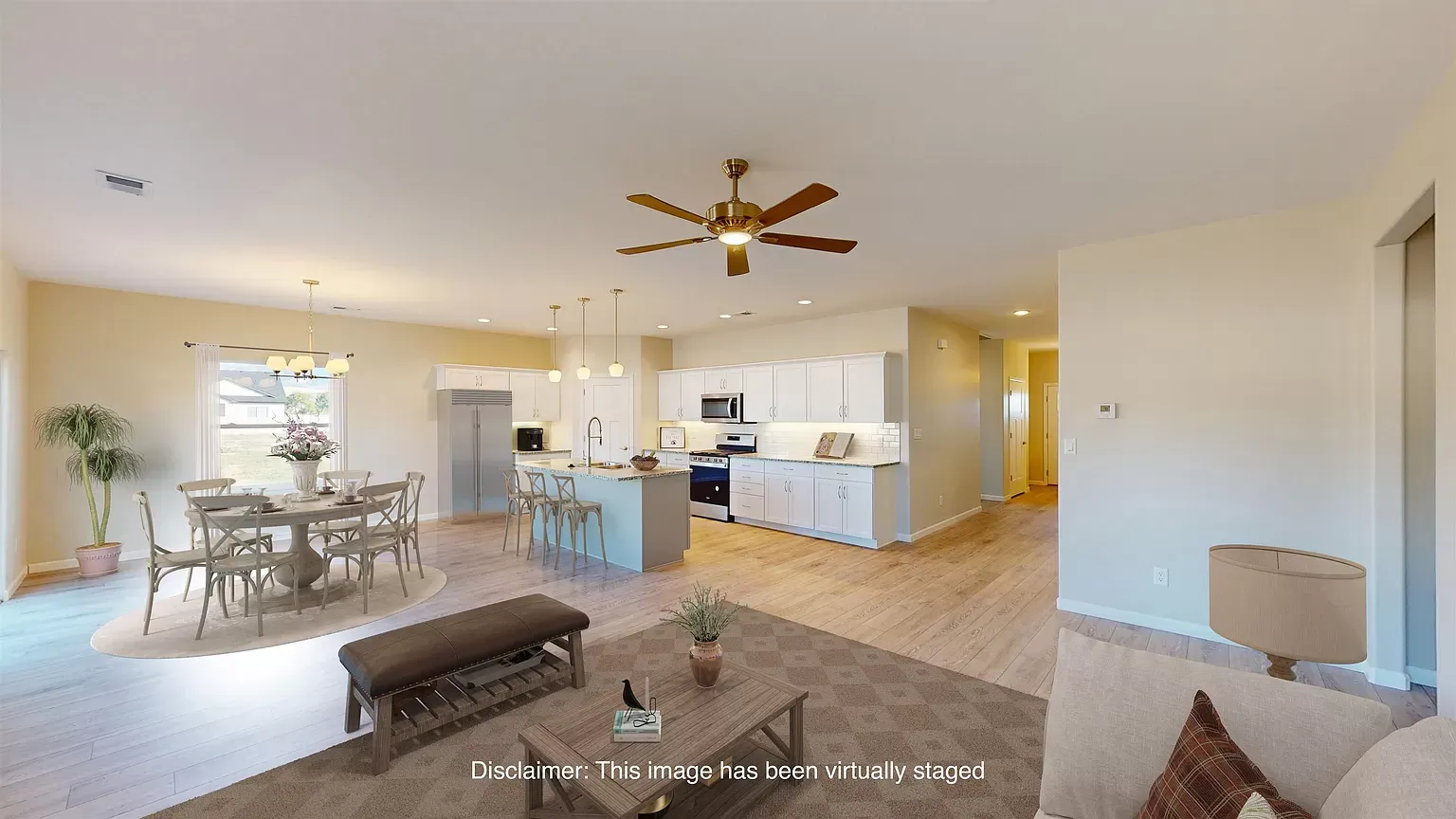 Virtually staged great room and kitchen in The Merlot, an Integrity Homes floor plan