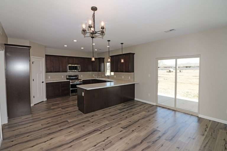 The Coral kitchen and dining area, new home by Integrity Homes in Western Colorado