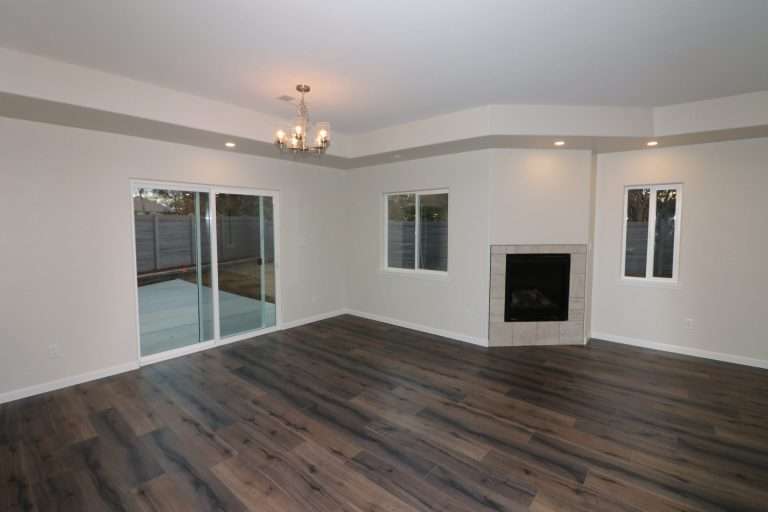 The Diamante living room with fireplace, new home by Integrity Homes in Western Colorado