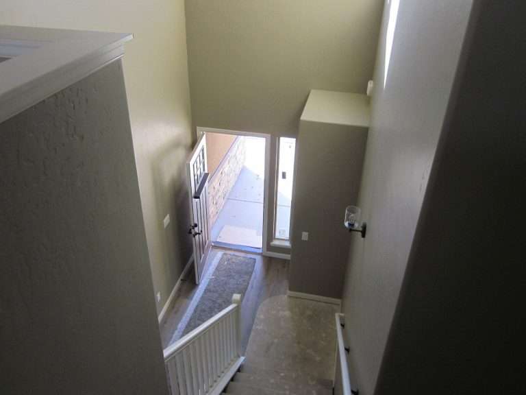 Casa Esmeralda staircase and hallway, new home by Integrity Homes in Western Colorado