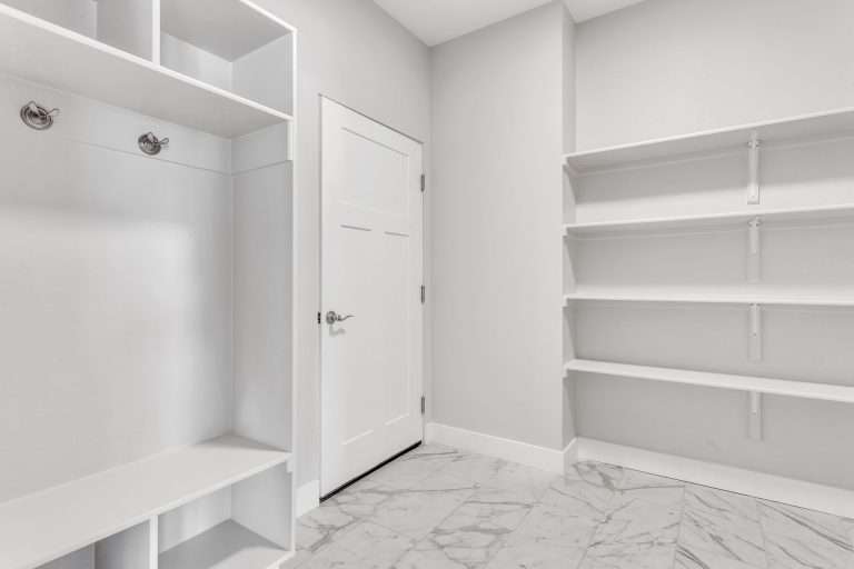 The Merlot mudroom with built-in bench, new home by Integrity Homes in Western Colorado