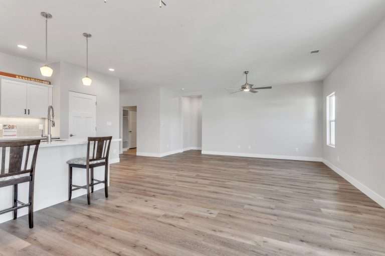 The Merlot kitchen and great room, new home by Integrity Homes in Western Colorado