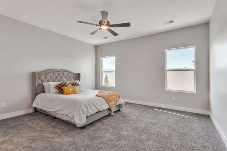 The Merlot primary bedroom (virtually staged), new home by Integrity Homes in Western Colorado