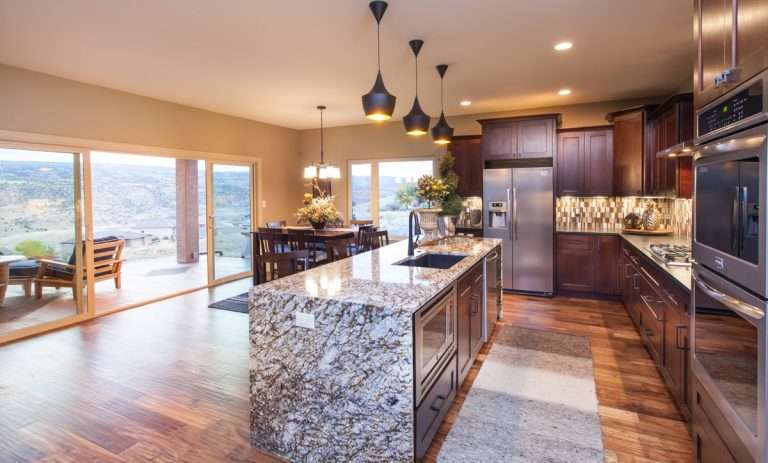 The Prestige kitchen and dining area, new home by Integrity Homes in Western Colorado