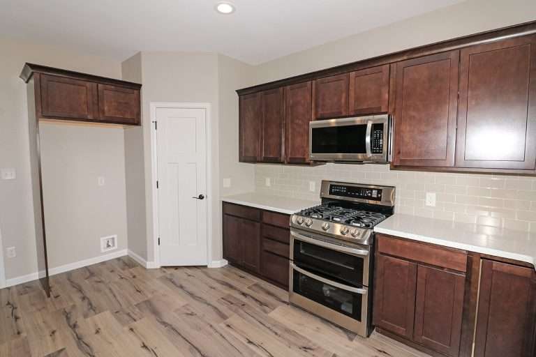 The Coral kitchen, new home by Integrity Homes in Western Colorado
