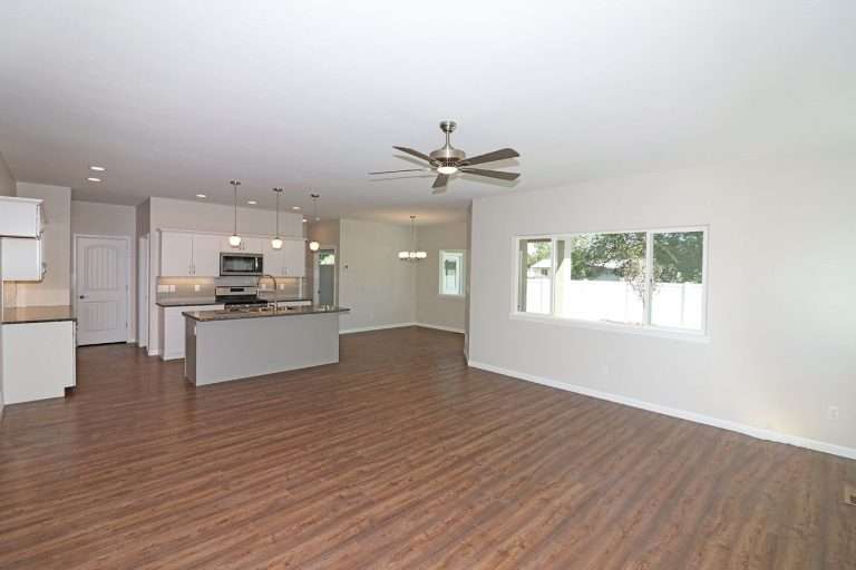 The Garfield living room and kitchen, new home by Integrity Homes in Western Colorado