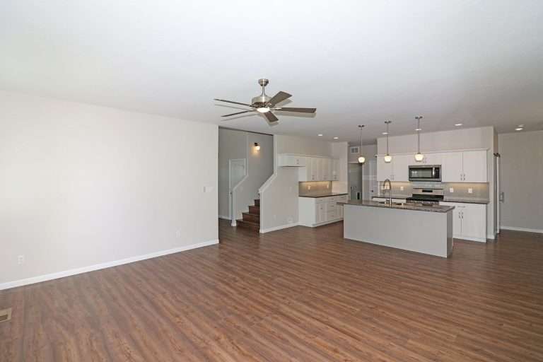The Garfield living room and kitchen, new home by Integrity Homes in Western Colorado