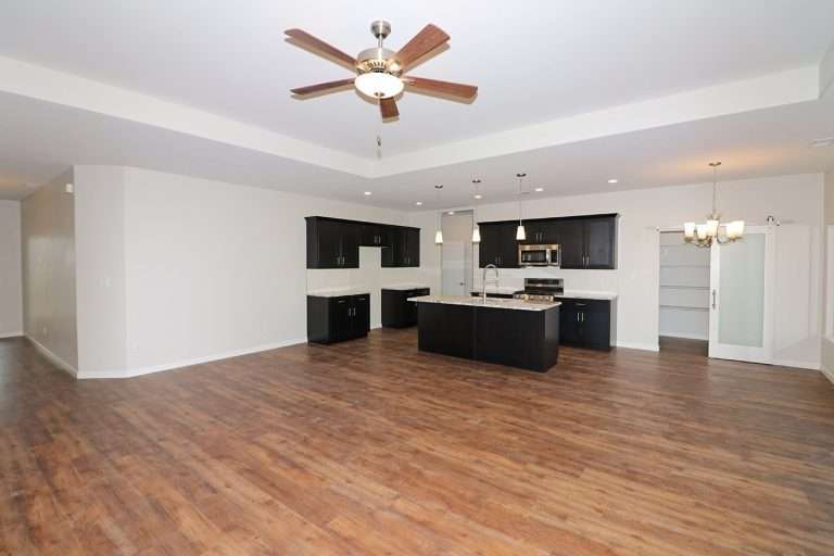 The Rubí great room and kitchen, new home by Integrity Homes in Western Colorado