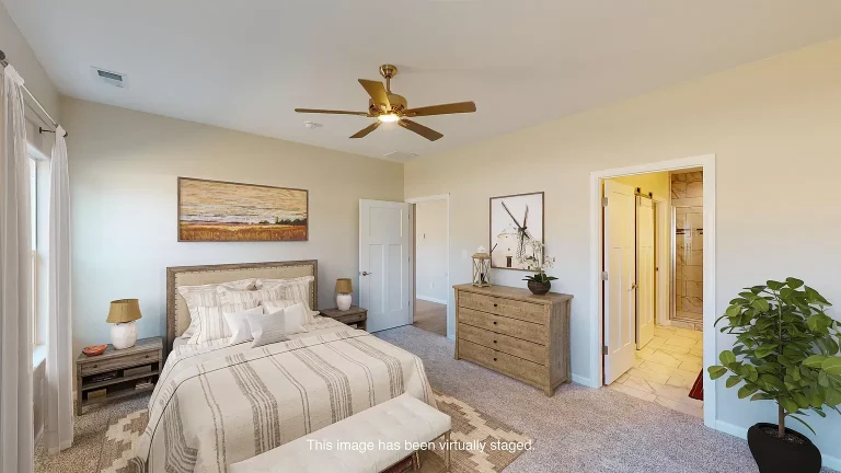 The Merlot primary bedroom (virtually staged), new home by Integrity Homes in Western Colorado