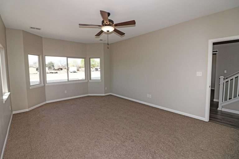 The Coral primary bedroom, new home by Integrity Homes in Western Colorado