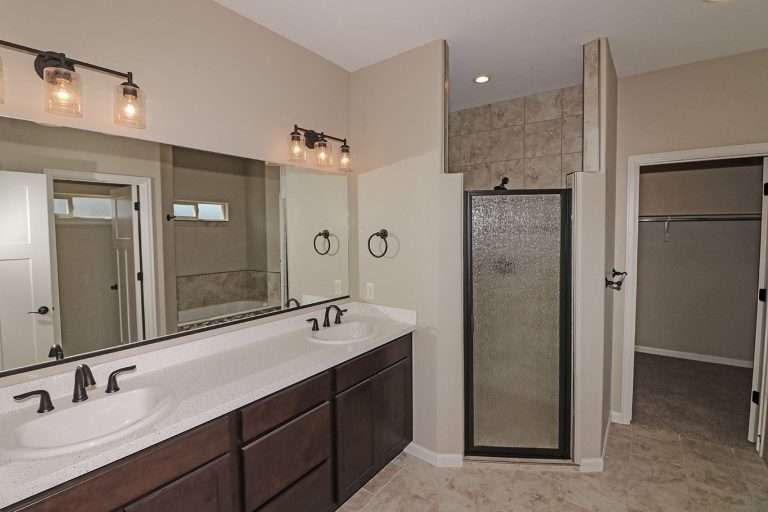 The Coral primary bathroom, new home by Integrity Homes in Western Colorado