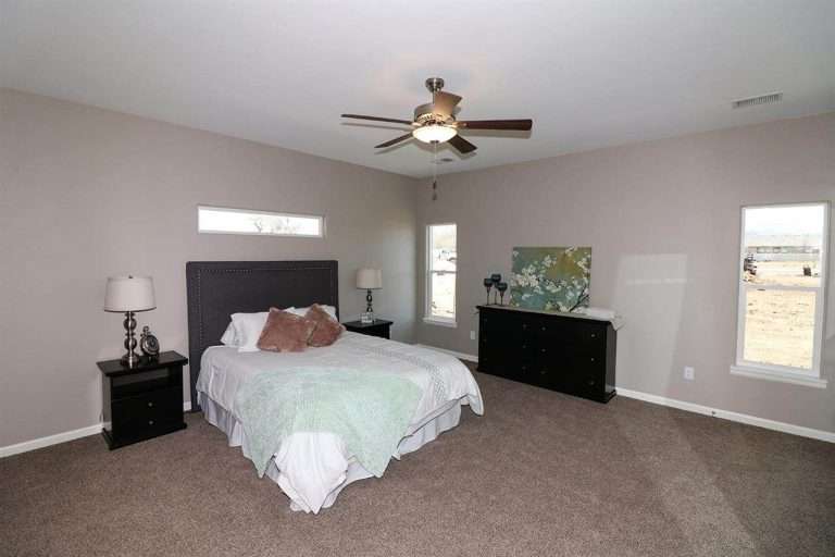 The Ópalo primary bedroom, new home by Integrity Homes in Western Colorado
