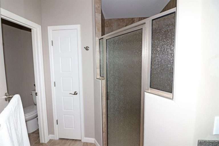 The Ópalo primary bathroom shower, new home by Integrity Homes in Western Colorado