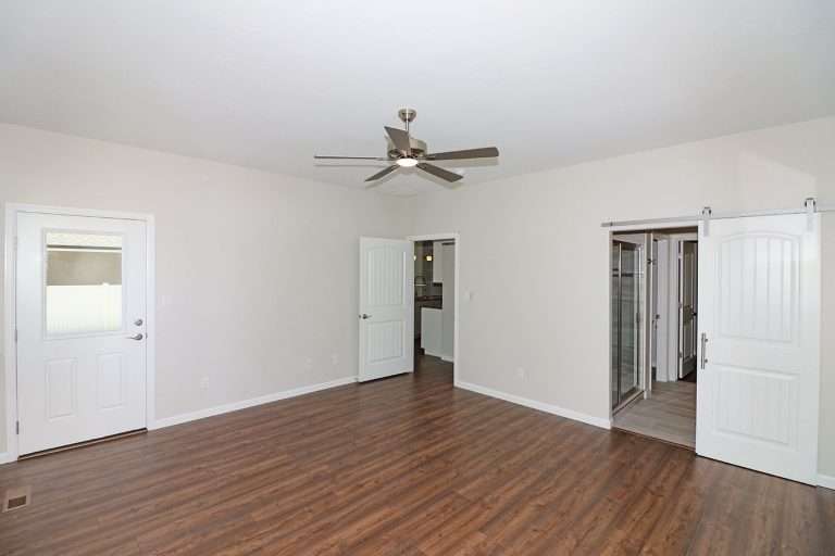 The Garfield primary bedroom, new home by Integrity Homes in Western Colorado