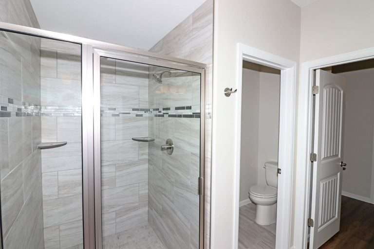 The Garfield primary bathroom shower, new home by Integrity Homes in Western Colorado