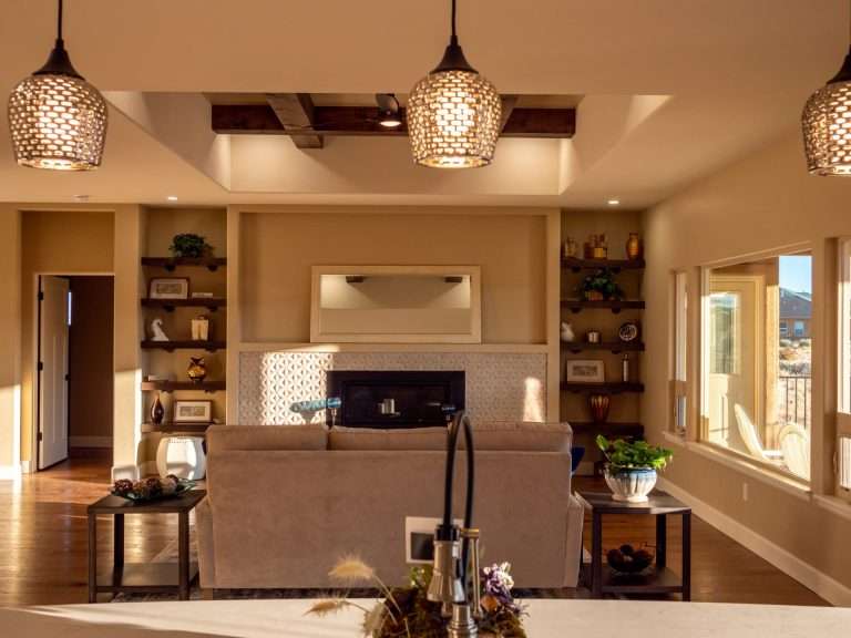 The Ridge living room with fireplace, new home by Integrity Homes in Western Colorado