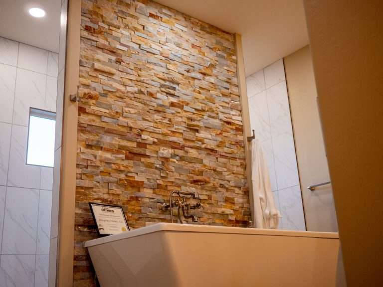 The Ridge primary bathroom with freestanding tub, new home by Integrity Homes in Western Colorado