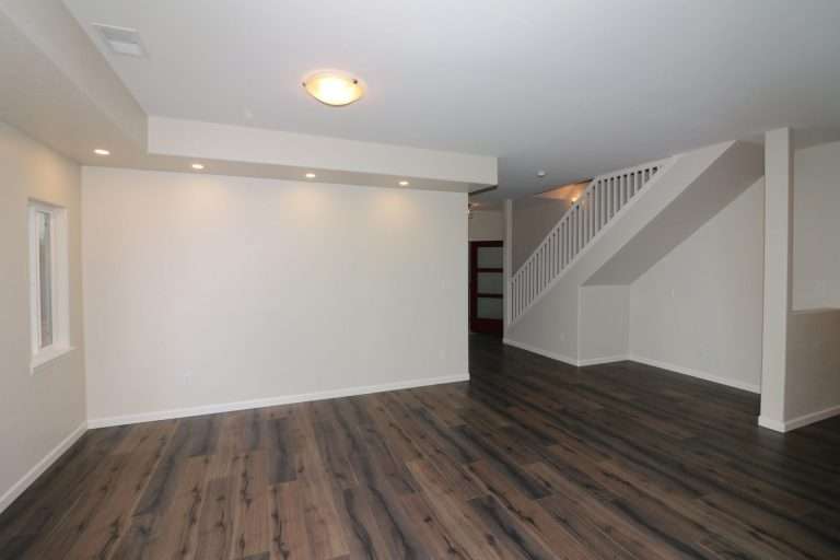 The Diamante living room and staircase, new home by Integrity Homes in Western Colorado