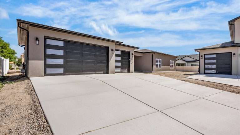 3316 Swan View Lane front exterior and driveway, Clifton, CO new home by Integrity Homes