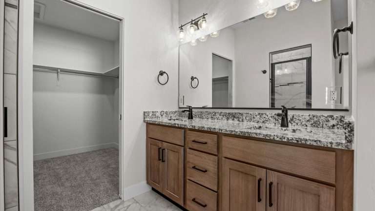 3316 Swan View Lane primary bathroom vanity, Clifton, CO new home by Integrity Homes