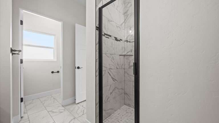 3316 Swan View Lane primary bathroom shower, Clifton, CO new home by Integrity Homes